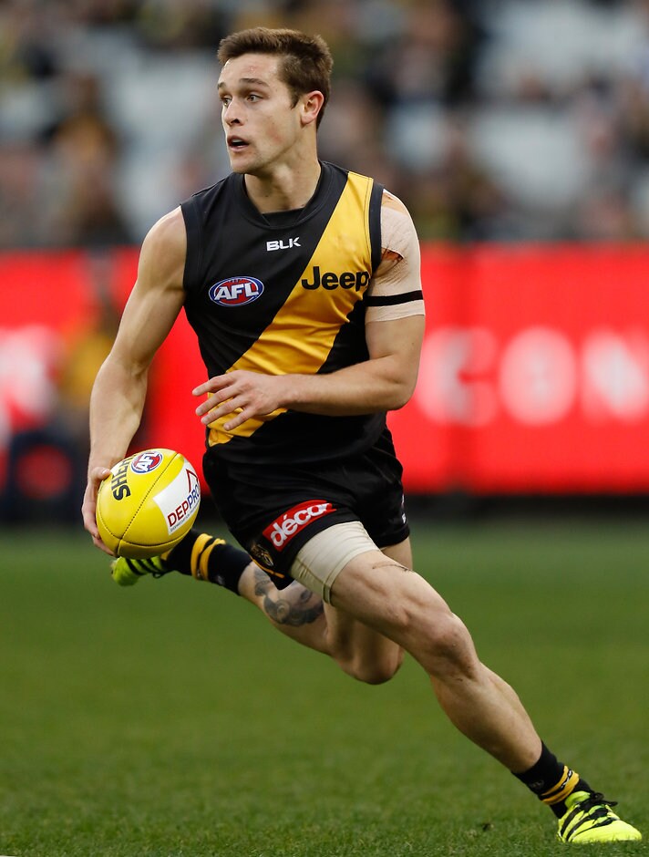 AFL 2016 Rd 21 - Richmond v Geelong MELBOURNE, AUSTRALIA - AUGUST 14: Jayden Short of the Tigers in action during the 2016 AFL Round 21 match between the Richmond Tigers and the Geelong Cats at the Melbourne Cricket Ground on August 14, 2016 in Melbourne, Australia. (Photo by Michael Willson/AFL Media)